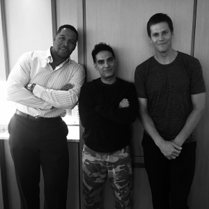 Gotham Chopra, center, with Religion of Sports executive producers Michael Strahan and Tom Brady.
