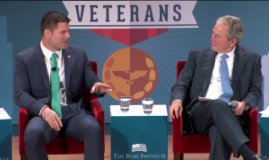 Stann speaks with President George W. Bush about the challenges facing returning veterans. 